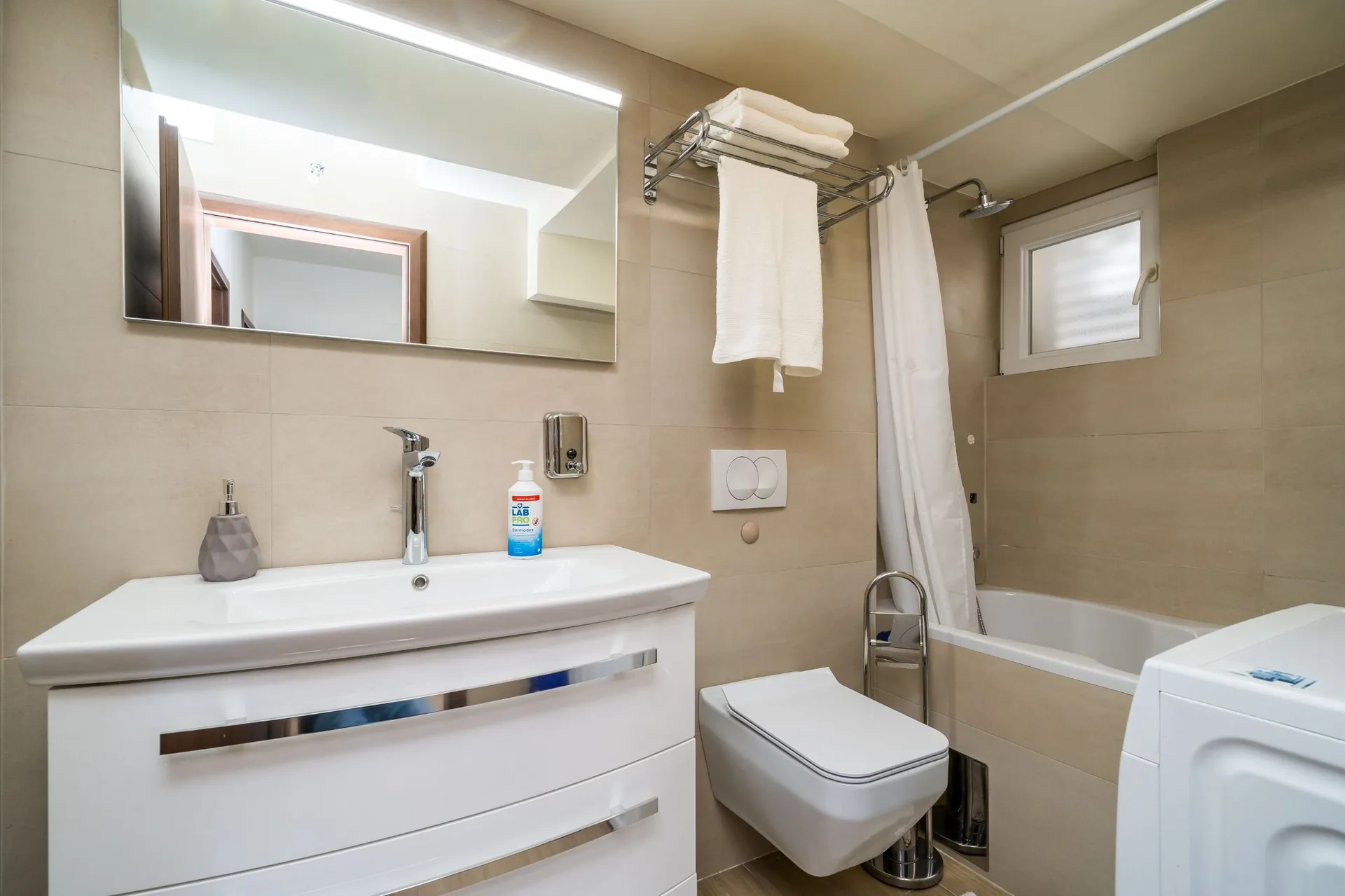 luciana residence bathroom bathtub washing machine