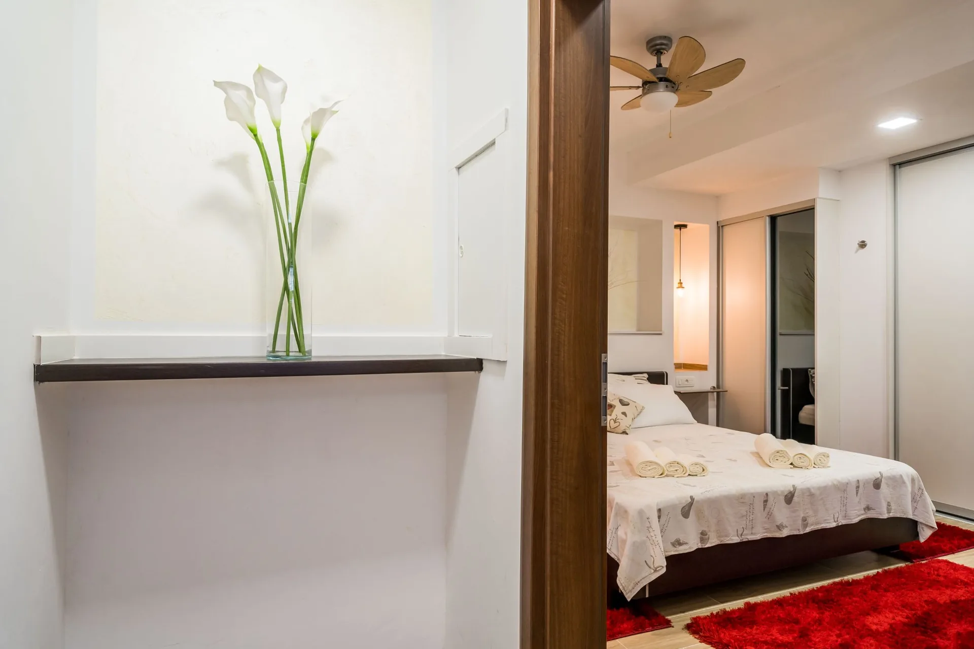 luciana residence bedroom entrance flowers