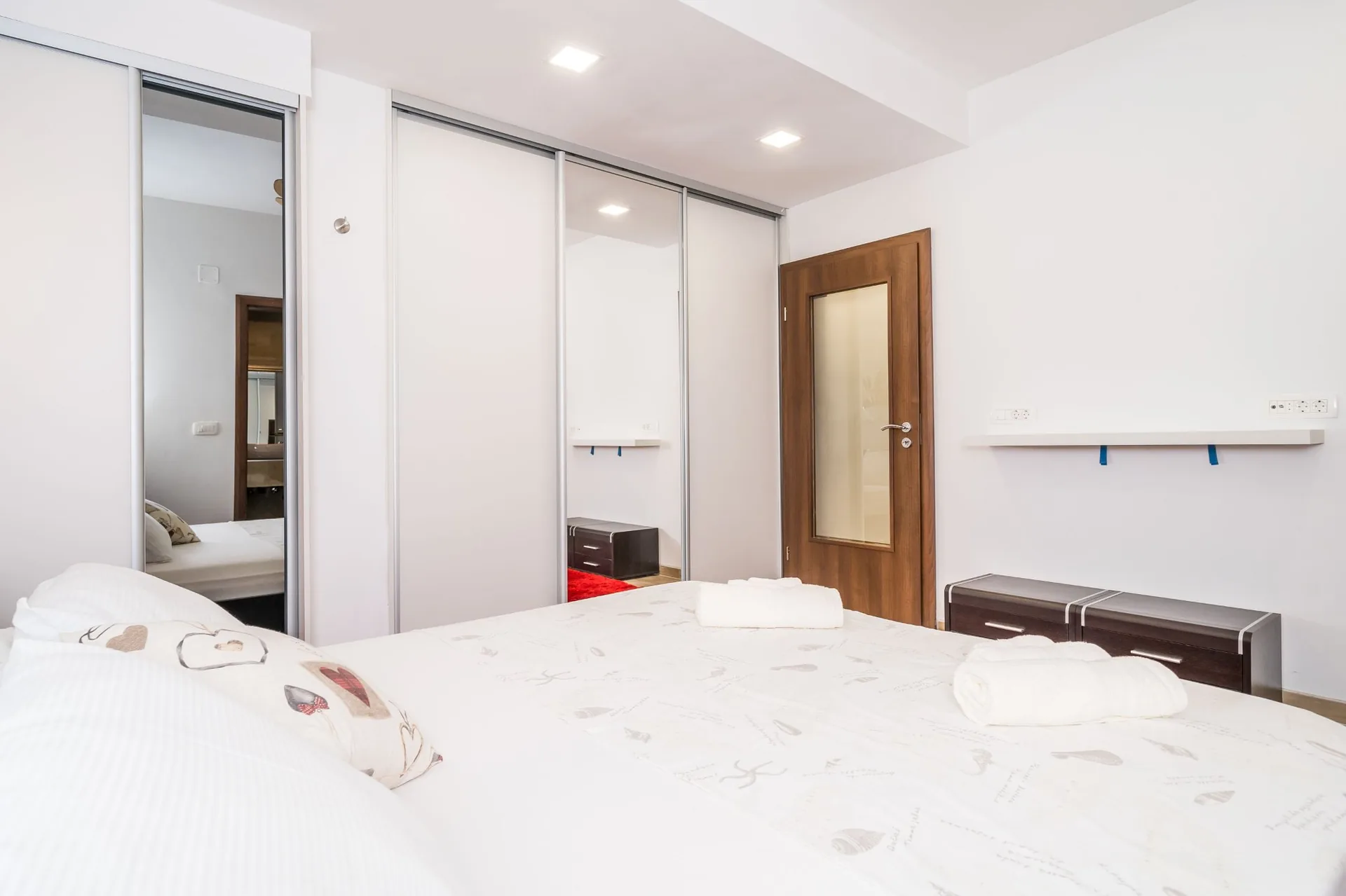 luciana residence bedroom mirrored wardrobe