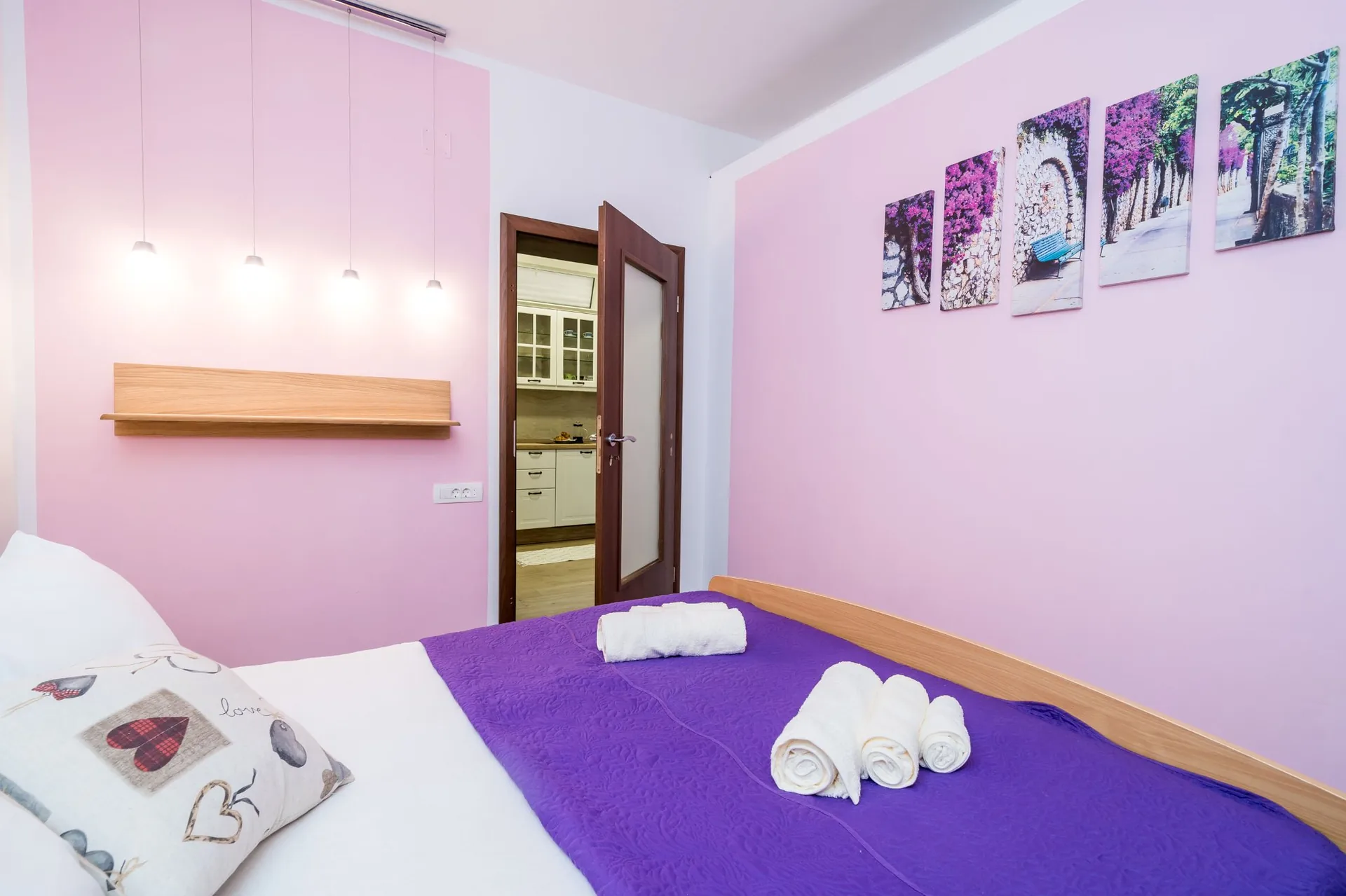 luciana residence bedroom pink wall artwork