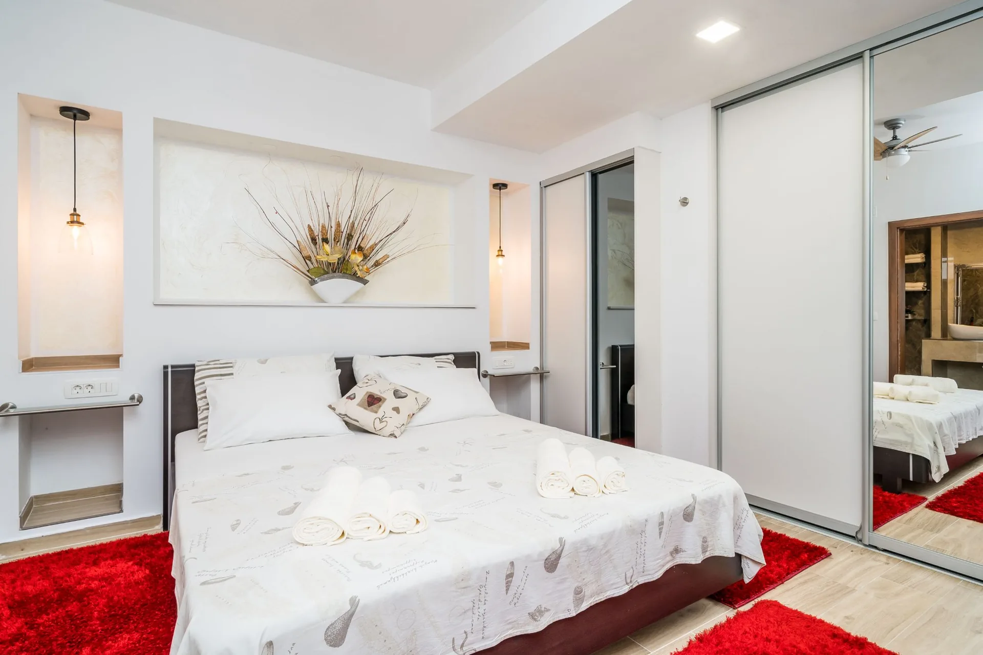 luciana residence master bedroom red rug