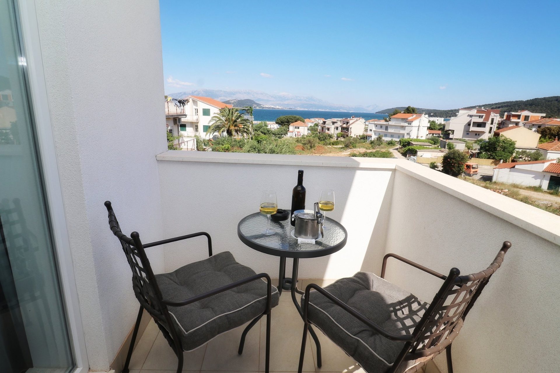 magico apartments balcony wine sea view sunset