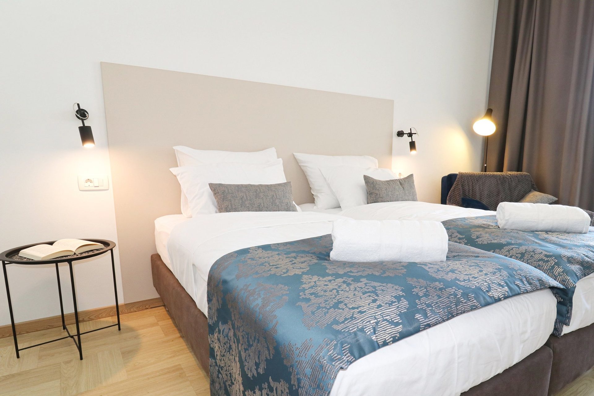 magico apartments bedroom blue headboard close up