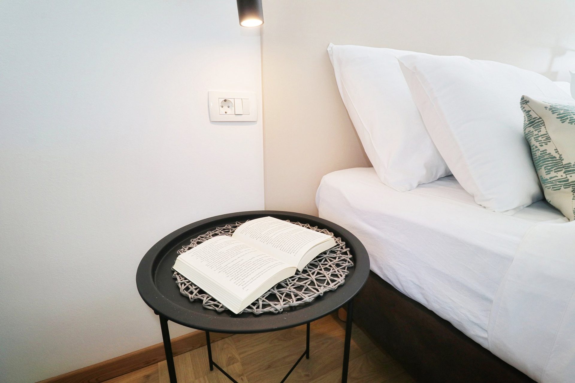 magico apartments bedside table book reading light