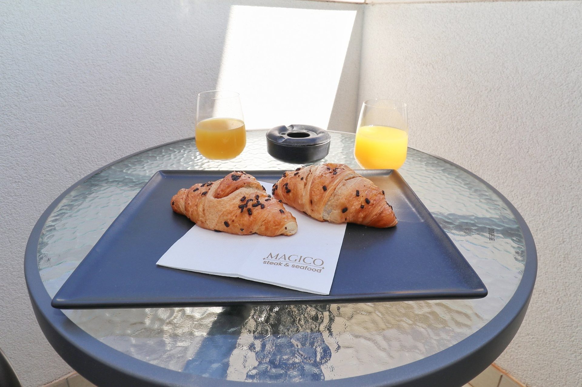 magico apartments breakfast croissants magico branding