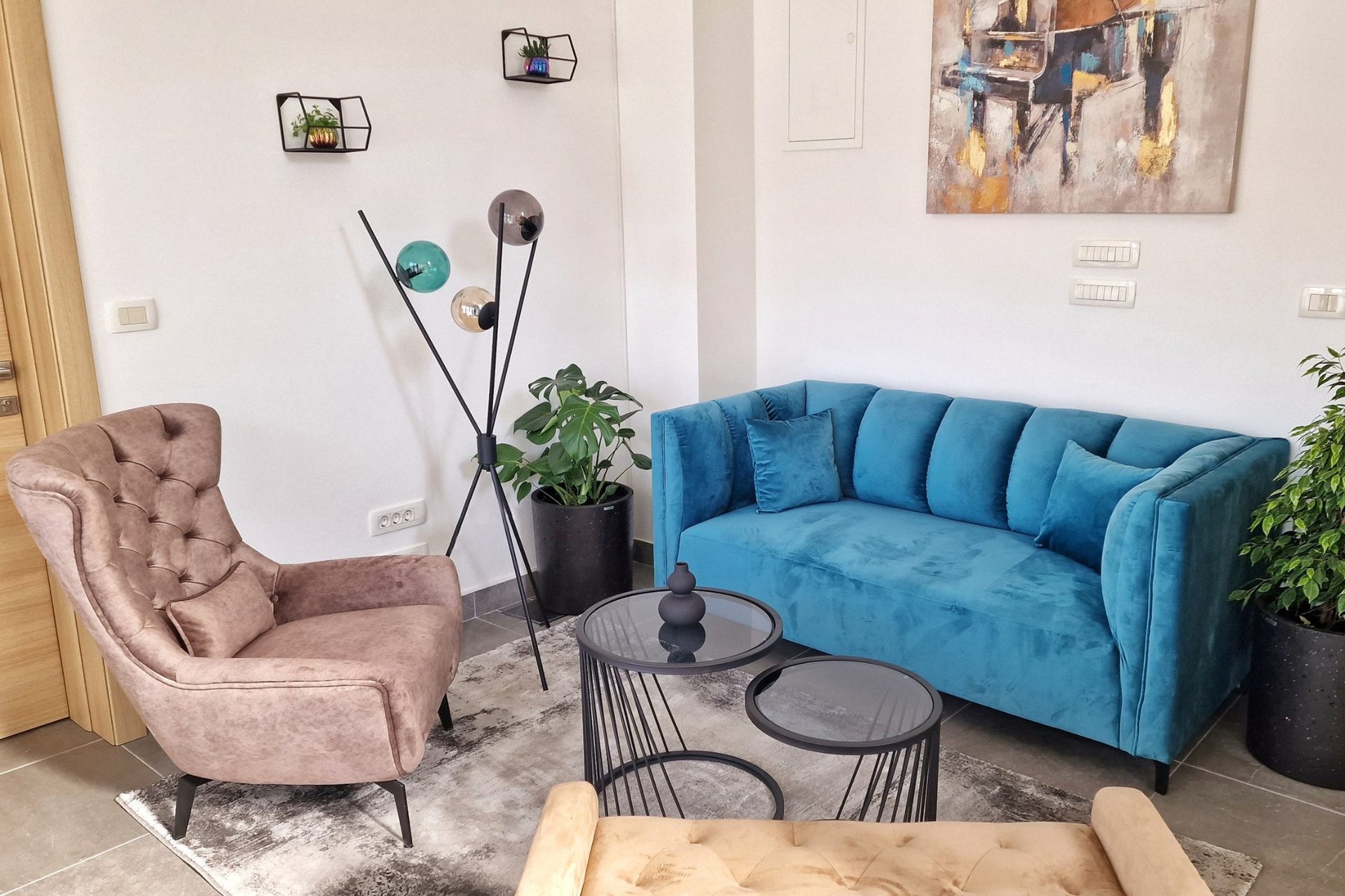 magico apartments lobby lounge blue velvet sofa