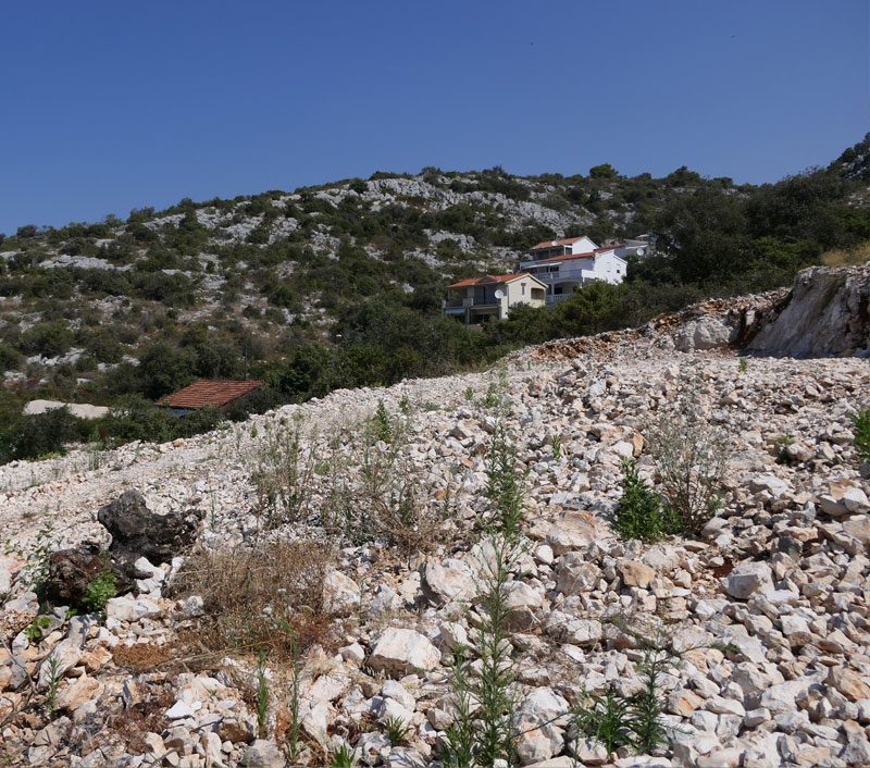 uvala luka building land rocky terrain houses croatia